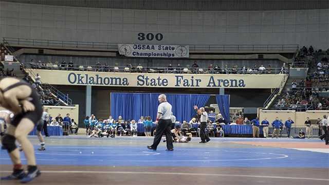 The 'Big House' During the consolation finals wrestlers from Classes 3A up to 6A wrestled at the same time under the lights at the Oklahoma State Fair Arena.