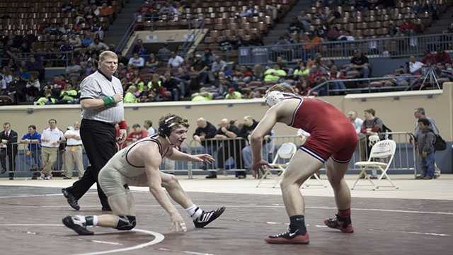 Patterson vs. Ray Salina's Cullen Patterson and Geary's Bradley Ray during their Class 3A consolation finals match at 120 lbs.
