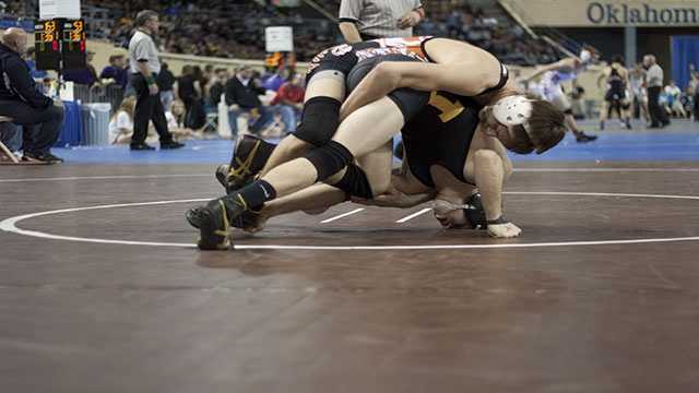 Crunch time Tonkawa's Gage Martin crunches Jay's Derick Shrum during the consolation finals for the Class 3A 132 lbs. during the OSSAA 92nd annual state wrestling tournament.
