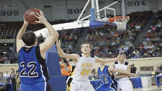 Looking for options Coyle's Ryan Weathers (22) looks to pass.