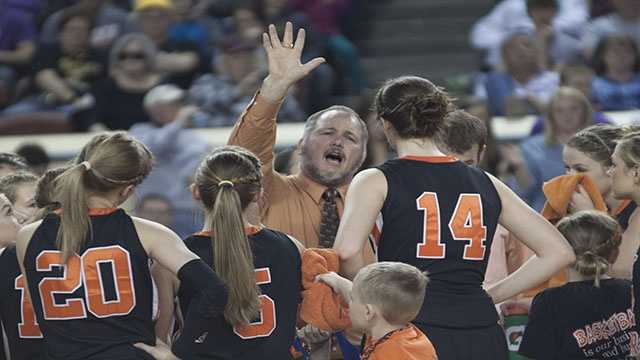 Inspiration Cheyenne-Reydon's head coach Brad Thrash tries to inspire his team during a timeout.