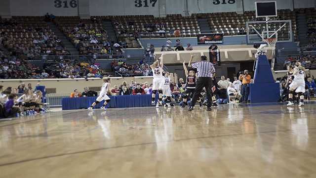 For three Madi Grellner (15) takes a three-point jumper, which she connects during Okarche's 59-47 victory to win the Class A girls state championship.