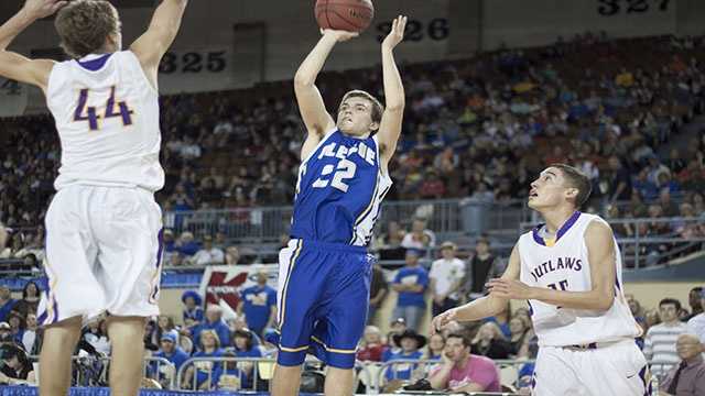 JakeLazenby.jpg Jake Lazenby (22) goes for two points as he is greeted by a Weleetka player.
