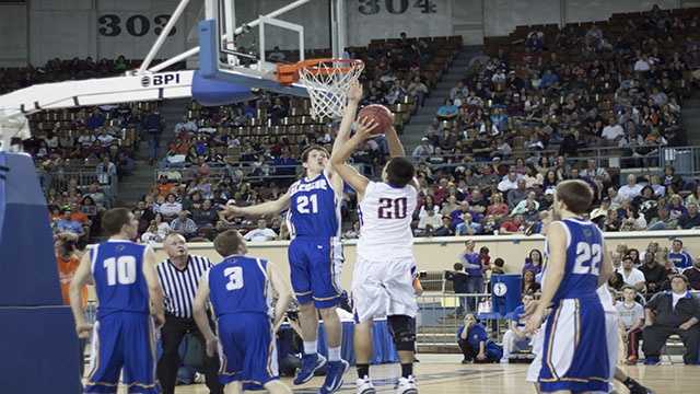 Blocked Hunter Hall (21) blocks the shot of a Weleetka player during the Class A boys championship finals.
