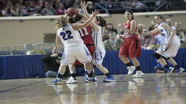 Lockdown The Lomega girls defense attempts to lockdown Erick's Maranda Janz (11).