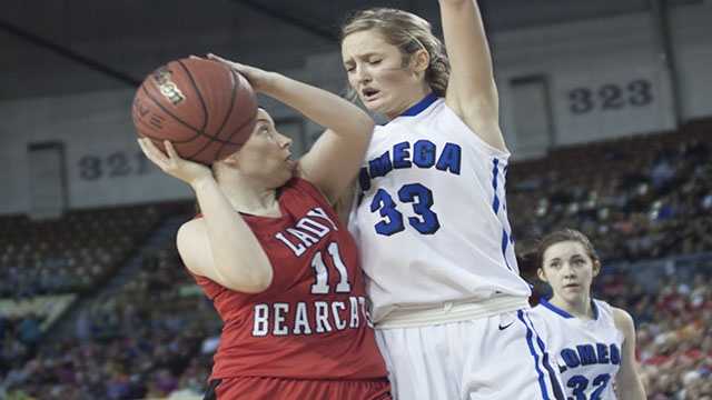 Up close and personal Erick's Maranda Janz (11) and Lomega's Hailey Duffy (33), become better acquainted after this play.
