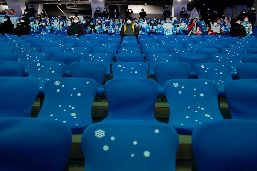 Beijing Olympics Getting A Glimpse Photo Gallery Spectators watch the pre-show ahead of the opening ceremony.