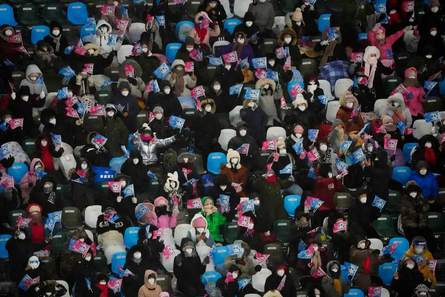 Beijing Olympics Getting A Glimpse Photo Gallery Spectators fill the stands before the women's moguls qualifying at Genting Snow Park.