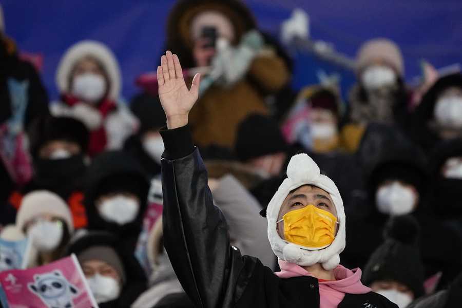Beijing Olympics Getting A Glimpse Photo Gallery Spectators watch during the men's moguls qualifying at Genting Snow Park.
