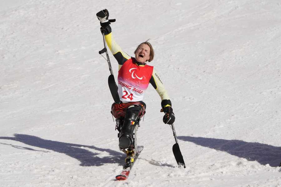 Paralympic Games Anna-Lena Forster of Germany reacts after competing in the women's super combined, slalom, sitting event at the 2022 Winter Paralympics, Monday, March 7, 2022, in the Yanqing district of Beijing.