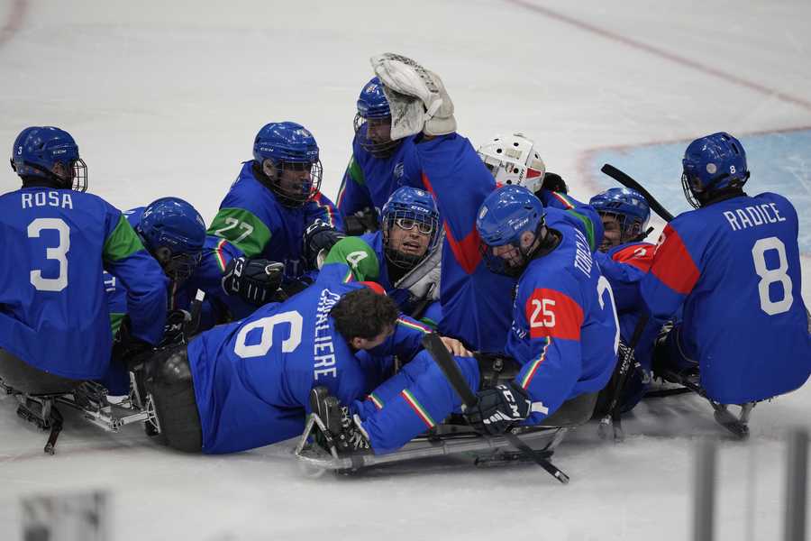 Paralympic Games Italian players celebrate their victory over Slovakia during their para ice hockey match at the 2022 Winter Paralympics, Sunday, March 6, 2022, in Beijing.